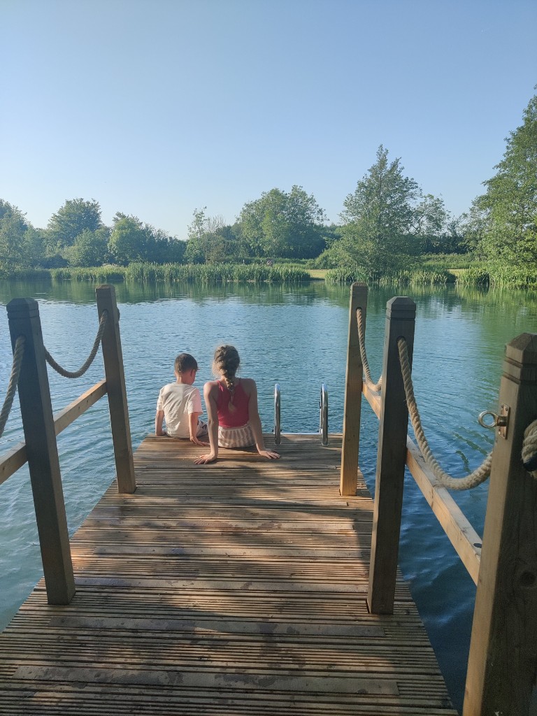 Kids on a lake dock